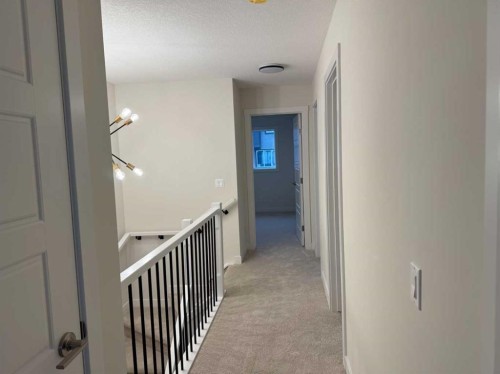 334 Sundown Road, Cochrane, AB - Indoor Photo Showing Other Room