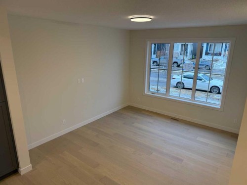 334 Sundown Road, Cochrane, AB - Indoor Photo Showing Other Room