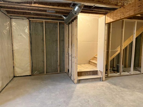 334 Sundown Road, Cochrane, AB - Indoor Photo Showing Basement