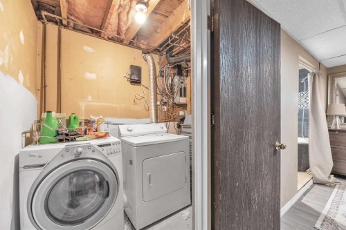 232 Abadan Place Ne, Calgary, AB - Indoor Photo Showing Laundry Room