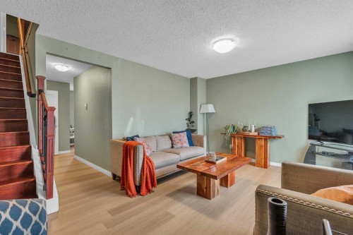 232 Abadan Place Ne, Calgary, AB - Indoor Photo Showing Living Room