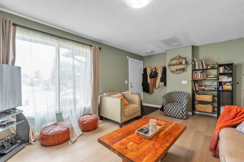 232 Abadan Place Ne, Calgary, AB - Indoor Photo Showing Living Room