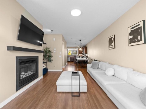 90 Skyview Ranch Gardens Ne, Calgary, AB - Indoor Photo Showing Living Room With Fireplace