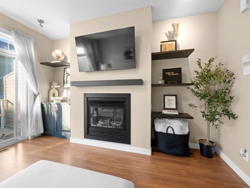 90 Skyview Ranch Gardens Ne, Calgary, AB - Indoor Photo Showing Living Room With Fireplace