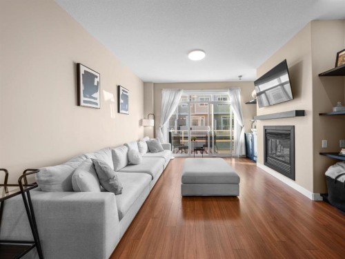 90 Skyview Ranch Gardens Ne, Calgary, AB - Indoor Photo Showing Living Room With Fireplace