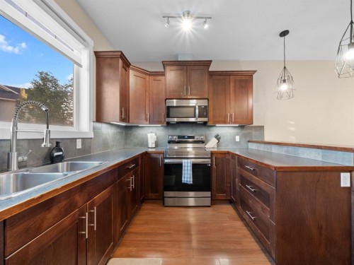 90 Skyview Ranch Gardens Ne, Calgary, AB - Indoor Photo Showing Kitchen With Double Sink