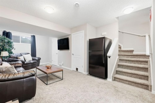 93 Auburn Meadows View Se, Calgary, AB - Indoor Photo Showing Living Room