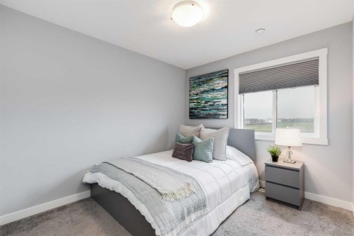 1037 Chinook Gate Heath Sw, Airdrie, AB - Indoor Photo Showing Bedroom
