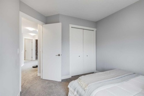 1037 Chinook Gate Heath Sw, Airdrie, AB - Indoor Photo Showing Bedroom