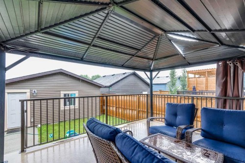 1037 Chinook Gate Heath Sw, Airdrie, AB - Outdoor With Deck Patio Veranda With Exterior