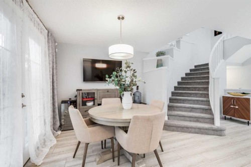 1037 Chinook Gate Heath Sw, Airdrie, AB - Indoor Photo Showing Dining Room