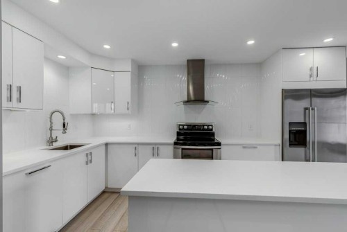 404-1208 14 Avenue Sw, Calgary, AB - Indoor Photo Showing Kitchen With Upgraded Kitchen