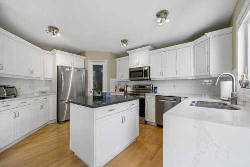 23 Valley Ponds Way Nw, Calgary, AB - Indoor Photo Showing Kitchen With Stainless Steel Kitchen