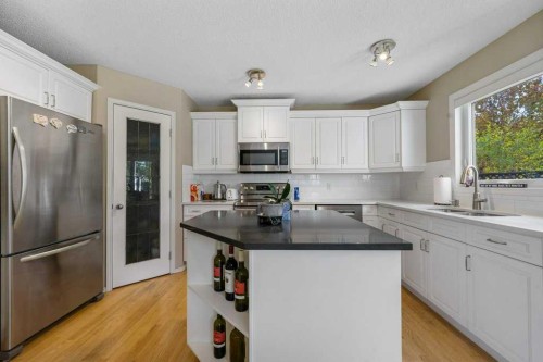 23 Valley Ponds Way Nw, Calgary, AB - Indoor Photo Showing Kitchen With Stainless Steel Kitchen With Upgraded Kitchen