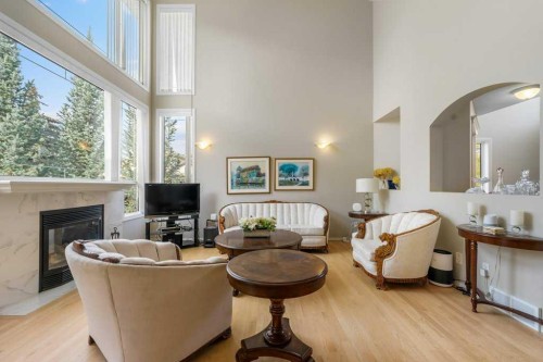 23 Valley Ponds Way Nw, Calgary, AB - Indoor Photo Showing Living Room With Fireplace