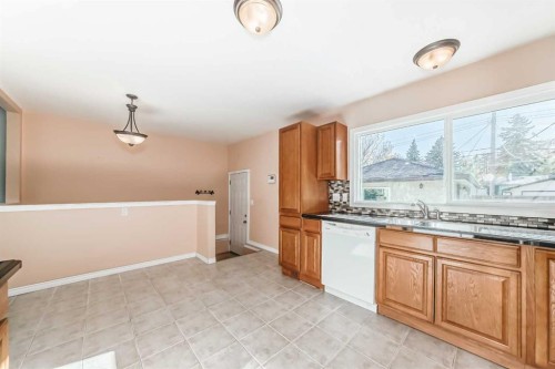 1942 Cottonwood Crescent Se, Calgary, AB - Indoor Photo Showing Kitchen With Double Sink