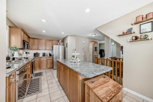 423 Morningside Way Sw, Airdrie, AB - Indoor Photo Showing Kitchen With Upgraded Kitchen
