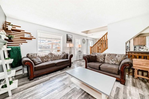 423 Morningside Way Sw, Airdrie, AB - Indoor Photo Showing Living Room