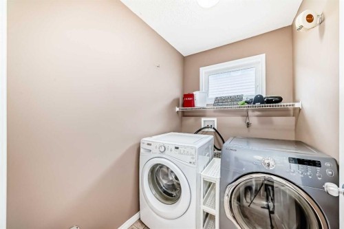 423 Morningside Way Sw, Airdrie, AB - Indoor Photo Showing Laundry Room