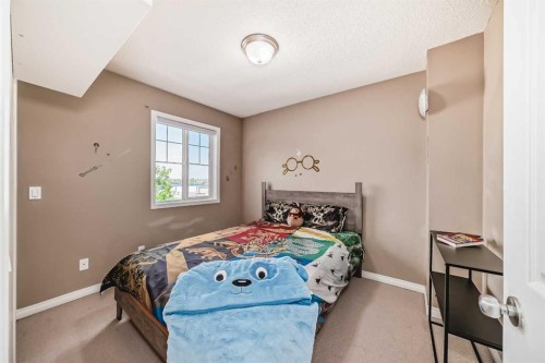 423 Morningside Way Sw, Airdrie, AB - Indoor Photo Showing Bedroom