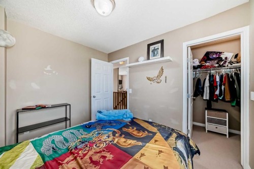 423 Morningside Way Sw, Airdrie, AB - Indoor Photo Showing Bedroom