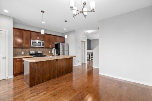 84 Fireside Way, Cochrane, AB - Indoor Photo Showing Kitchen