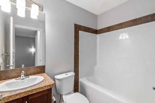84 Fireside Way, Cochrane, AB - Indoor Photo Showing Bathroom