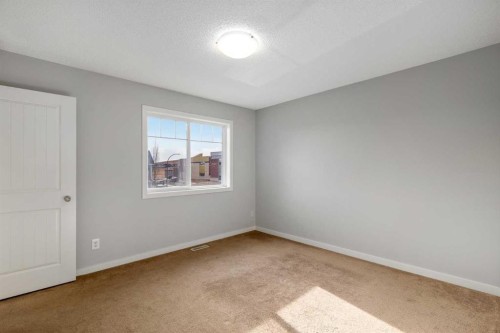 84 Fireside Way, Cochrane, AB - Indoor Photo Showing Other Room