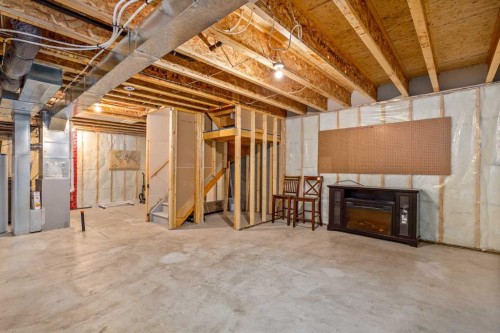 84 Fireside Way, Cochrane, AB - Indoor Photo Showing Basement