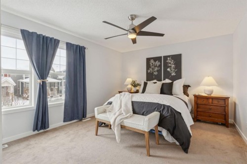 480 River Heights Green, Cochrane, AB - Indoor Photo Showing Bedroom