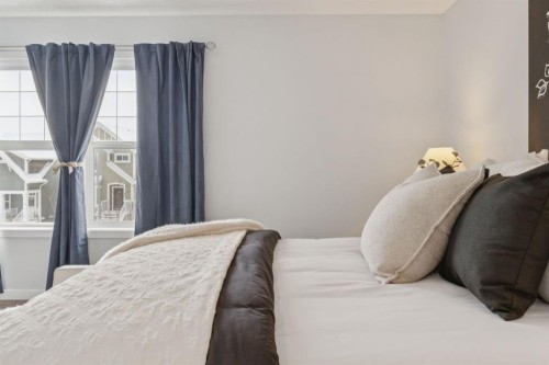 480 River Heights Green, Cochrane, AB - Indoor Photo Showing Bedroom