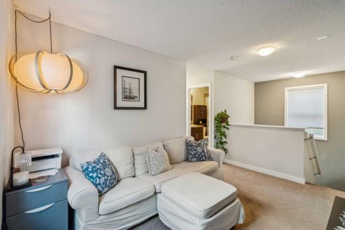 480 River Heights Green, Cochrane, AB - Indoor Photo Showing Living Room