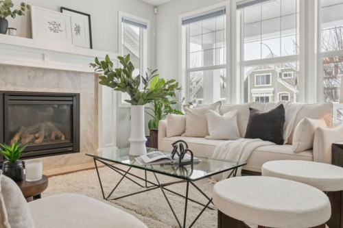 480 River Heights Green, Cochrane, AB - Indoor Photo Showing Living Room With Fireplace