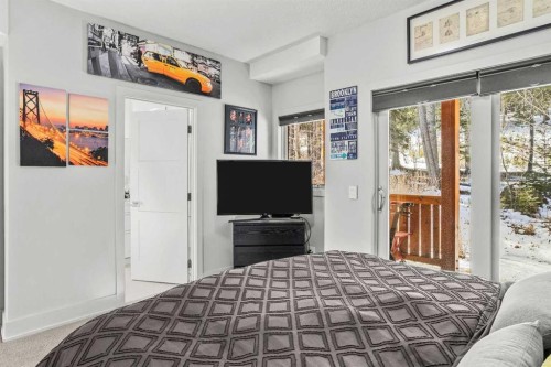 501H-3000 Stewart Creek Drive, Canmore, AB - Indoor Photo Showing Bedroom