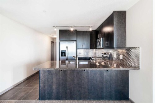 2010-210 15 Avenue Se, Calgary, AB - Indoor Photo Showing Kitchen With Double Sink With Upgraded Kitchen