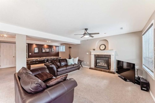 238 Citadel Hills Circle Nw, Calgary, AB - Indoor Photo Showing Living Room With Fireplace