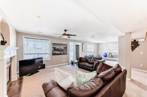 238 Citadel Hills Circle Nw, Calgary, AB - Indoor Photo Showing Living Room With Fireplace