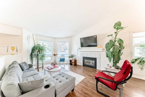 238 Citadel Hills Circle Nw, Calgary, AB - Indoor Photo Showing Living Room With Fireplace