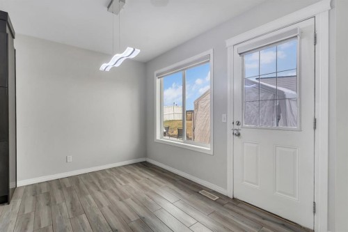 11 Saddlebrook Way Ne, Calgary, AB - Indoor Photo Showing Other Room