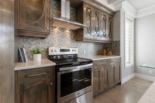 13003 Township Road 265, Rural Rocky View County, AB - Indoor Photo Showing Kitchen With Upgraded Kitchen
