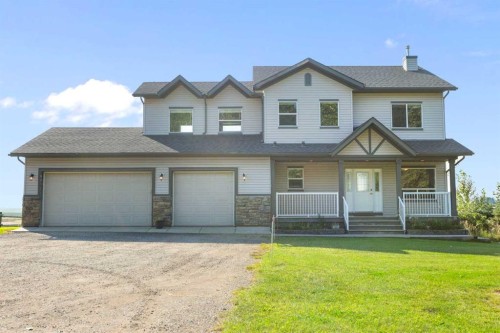 13003 Township Road 265, Rural Rocky View County, AB - Outdoor With Facade