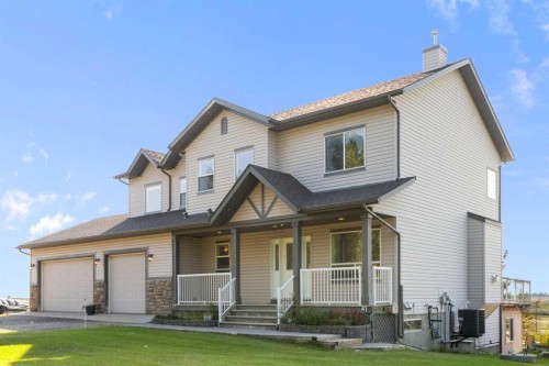 13003 Township Road 265, Rural Rocky View County, AB - Outdoor With Deck Patio Veranda With Facade