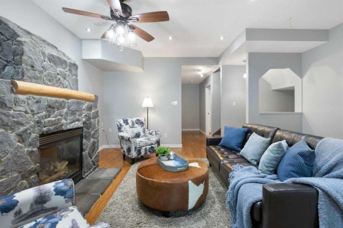 13003 Township Road 265, Rural Rocky View County, AB - Indoor Photo Showing Living Room With Fireplace