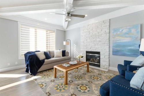 13003 Township Road 265, Rural Rocky View County, AB - Indoor Photo Showing Living Room With Fireplace