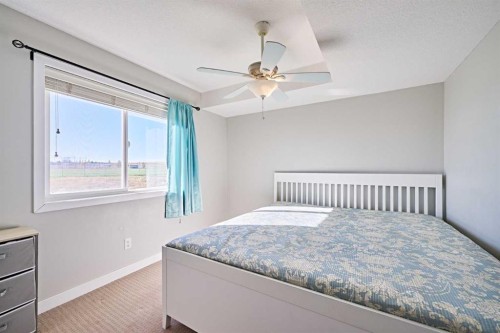 7101-2781 Chinook Winds Drive Sw, Airdrie, AB - Indoor Photo Showing Bedroom
