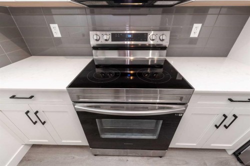 1105-200 Seton Circle Se, Calgary, AB - Indoor Photo Showing Kitchen