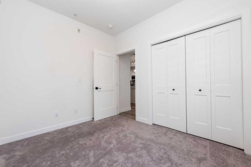 1105-200 Seton Circle Se, Calgary, AB - Indoor Photo Showing Other Room