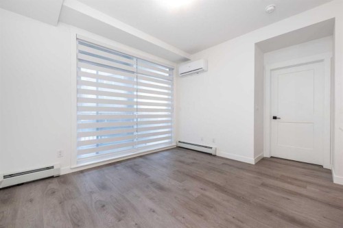 1105-200 Seton Circle Se, Calgary, AB - Indoor Photo Showing Other Room