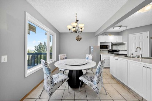 64 Macewan Park Rise Nw, Calgary, AB - Indoor Photo Showing Dining Room