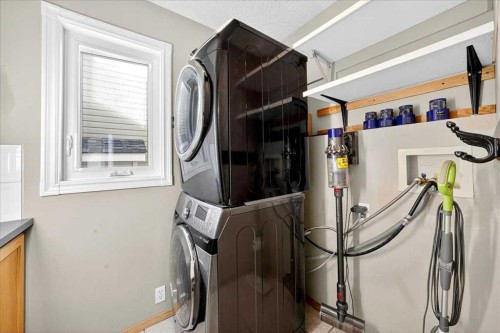 64 Macewan Park Rise Nw, Calgary, AB - Indoor Photo Showing Laundry Room